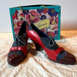 Never worn poetic license wedge